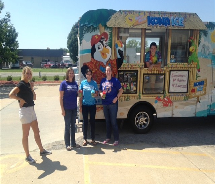 Kona Ice Truck being visited by 4 Insurance Agents
