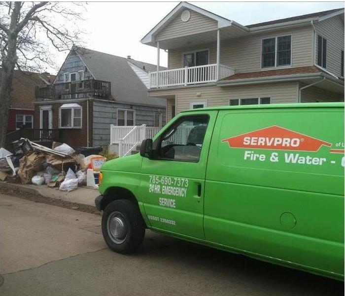 SERVPRO van parked in front of residence affected by storm